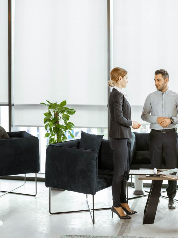 couple-with-business-consultants-at-the-office.jpg